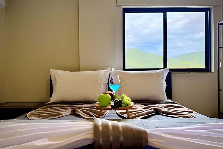 Refúgio a 450m da Praia com Wi-Fi e Churrasqueira