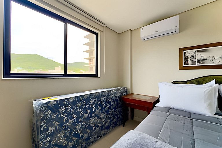 Refúgio a 450m da Praia com Wi-Fi e Churrasqueira