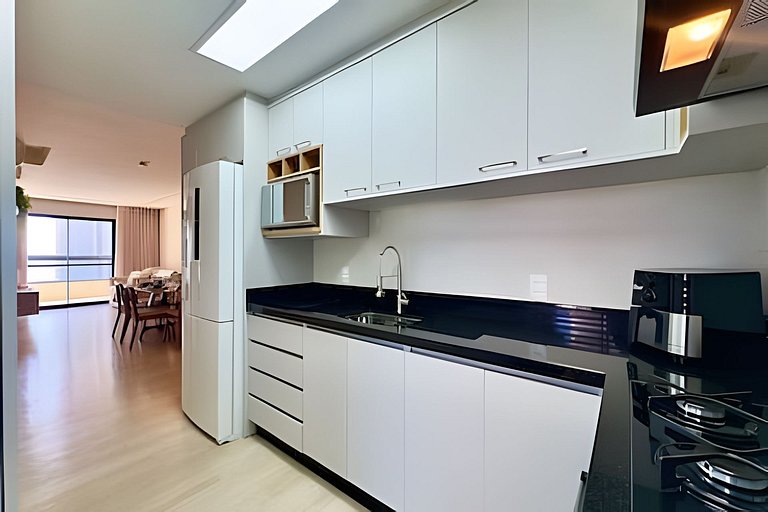 A 150m da PRAIA climatizado, Churrasq. e Wi-fi